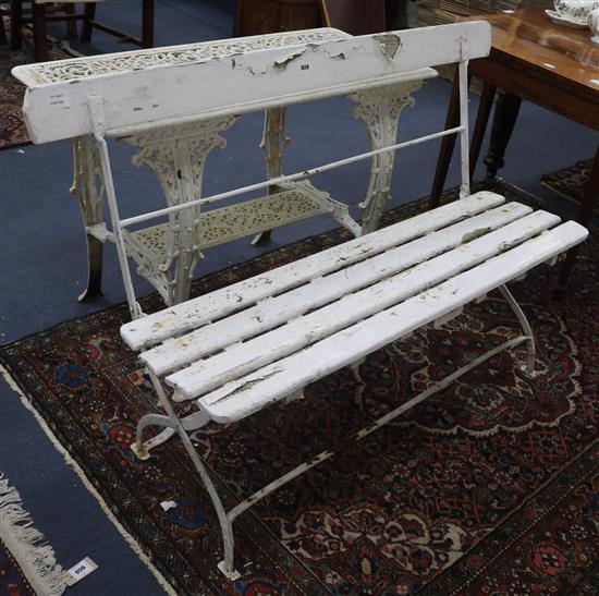 A wrought iron bench, W.130cm